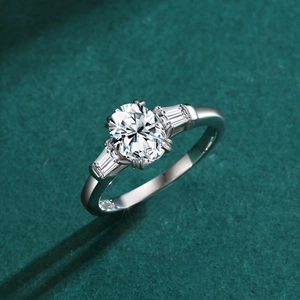 Luxury S925 silver engagement ring with oval main stone and emerald cut side diamonds