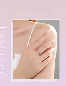 Elegant s925 silver leaf ring shown on model finger with a minimalist vine design