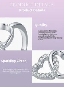 Detail view of double heart S925 sterling silver ring with cubic zirconia and mirror polish