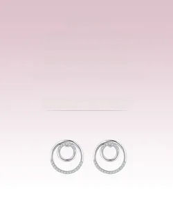 Detailed view of silver s925 round stud earrings with shimmering micro-pave crystals