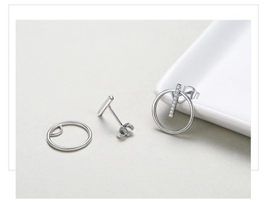 Detailed view of S925 sterling silver geometric earrings with micro-inlaid zircon and butterfly back