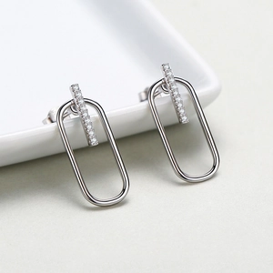 S925 sterling silver geometric stud earrings with pavé micro zircons on a white tray