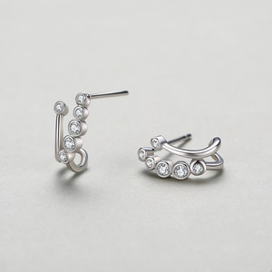 Elegant 925 sterling silver double-row curved stud earrings with inlaid cubic zirconia
