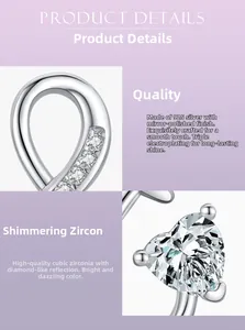 Détail de boucles d'oreilles en argent 925 avec zircons et finition polissage miroir