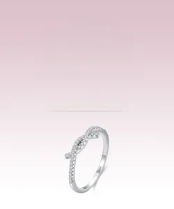 Detail shot of the S925 sterling silver stamp on a twisted ring with micro-pave zircons