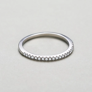 Minimalist S925 sterling silver band ring featuring a row of shimmering pavé zircons