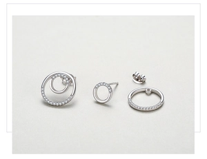 Detail view of S925 silver stud earring showing detachable micro-pave zirconia rings