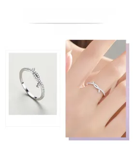 Macro detail and model view of an S925 silver infinity knot ring with micro pavé zircons