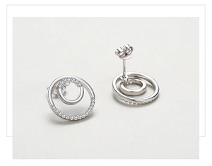 Macro view of S925 sterling silver geometric double circle earrings with micro-pave stones