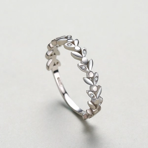 S925 sterling silver olive leaf ring with pave cubic zirconia from a 45-degree angle
