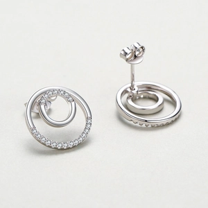 Minimalist S925 sterling silver circular stud earrings with pave-set zircon accents