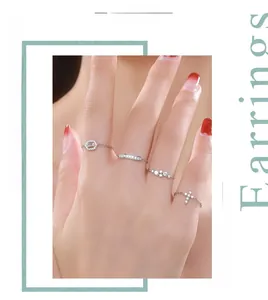 Detailed close-up of a s925 silver cross ring set with sparkling zircon insets