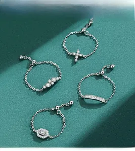 Detail of adjustable S925 silver chain rings with sparkling zircon inlay in four styles