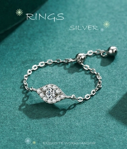 Detailed close-up of s925 silver evil eye chain ring with micro-paved cubic zirconia