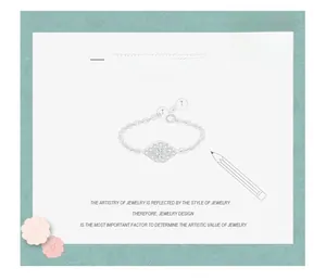 Detailed jewelry sketch of a sterling silver chain ring with pavé evil eye motif