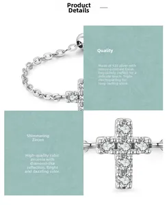 Close-up of S925 sterling silver cross ring with pavé zirconia and triple-layer plating