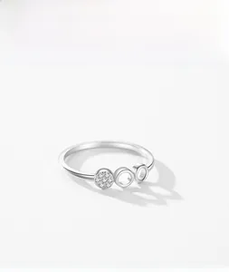 Macro shot of S925 sterling silver ring with geometric pave crystal disk detail