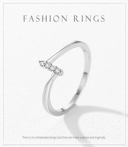 Detailed view of S925 sterling silver bypass ring with four sparkling zircon stones