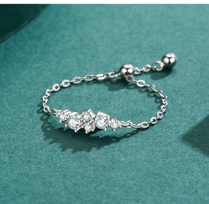 Detailed view of S925 sterling silver chain ring with cluster of brilliant micro-set zircons
