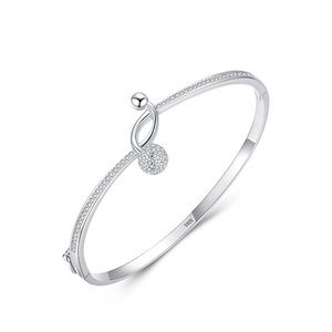 S925 sterling silver bangle featuring a twisted knot design and shimmering zircon beads