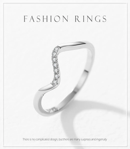 Detailed view of 925 sterling silver wavy ring with micro-paved sparkling zircon stones