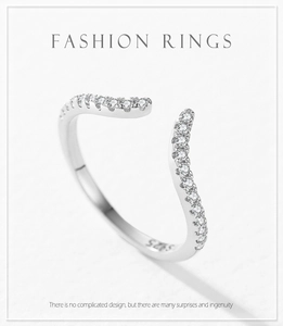 Close-up of s925 silver wavy ring with micro-pave white zircon and hallmark