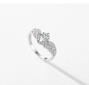 Macro detail of S925 sterling silver stamp and sparkling zircon angel wing ring design
