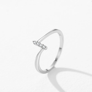 Minimalist S925 sterling silver open ring with sparkling row of four clear zircons
