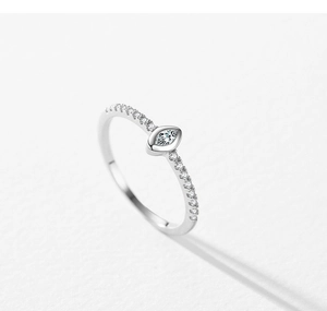 Detail of s925 silver marquise-cut zircon ring with pavé side stones on a textured backdrop