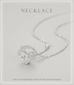 Detail view of S925 sterling silver lucky leaf pendant with sparkling pave crystals