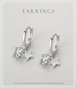 Détail de boucles d'oreilles en argent S925 avec pendentifs étoiles en zircone