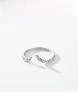 Detailed macro view of S925 sterling silver open ring with paved cubic zirconia stones