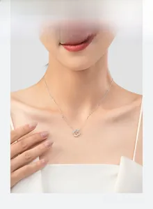 Detail view of s925 sterling silver lucky leaf pendant necklace with micro-pave crystals