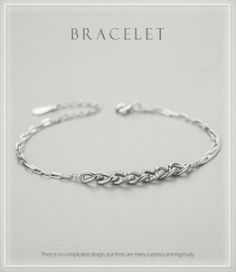 Detailed macro view of S925 silver bracelet featuring double layers and micro-pave crystals