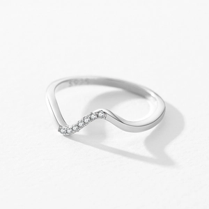 Minimalist 925 sterling silver wavy ring featuring sparkling pavé cubic zirconia accents