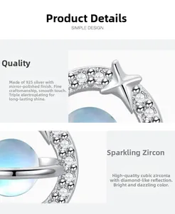 Detailed macro view of S925 silver moonstone planet earrings with micro-inlaid zirconia