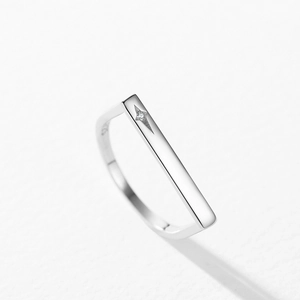 Minimalist S925 sterling silver ring with four-pointed star and sparkling zircon stone