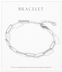 Detailed view of S925 sterling silver paperclip link bracelet with lobster clasp and tag