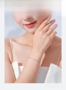 Minimalist 925 sterling silver chain bracelet shown on a woman wrist for a delicate look