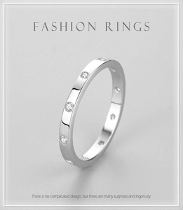 Macro view of minimalist s925 silver ring featuring micro-pave set round clear stones