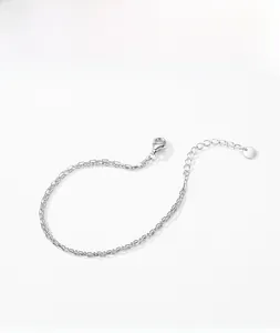 Detail of silver double-layered chain bracelet with lobster clasp and extension chain