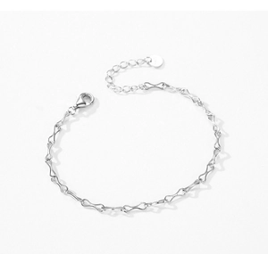 Detailed view of S925 sterling silver infinity link bracelet with hallmark charm