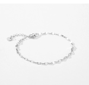 Close-up of S925 sterling silver chain bracelet with shimmering flat oval leaf links
