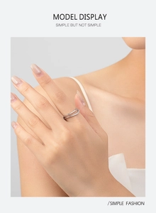 Detail of s925 silver double layer ring with micro-pave crystals on female hand