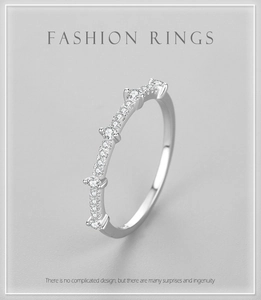 Detailed view of 925 sterling silver ring with delicate micro-pave diamond inlay