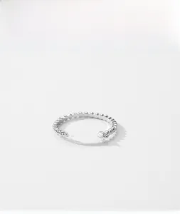 Detail of s925 silver beaded ring featuring a sparkling micro-set cubic zirconia stone