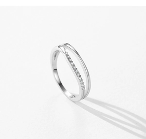 Detail of s925 silver double-layered ring featuring pavé set zircons and polished finish