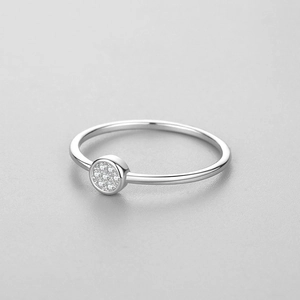Minimalist S925 sterling silver ring featuring a round micro-pave cubic zirconia setting