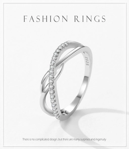 Detailed view of S925 sterling silver stamp on the inner band of the crisscross pave ring