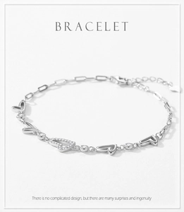 Detail of S925 sterling silver heart bracelet featuring micro-pave cubic zirconia stones